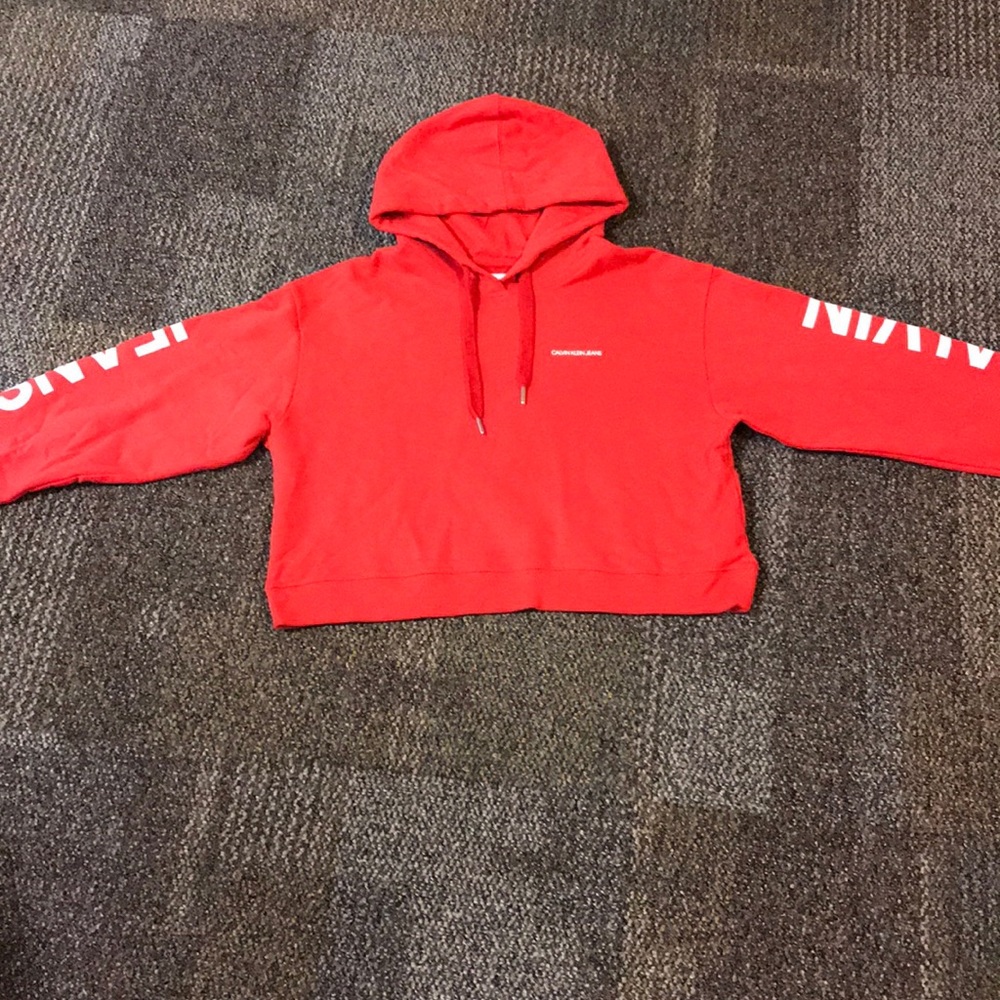 Red cropped sweatshirt.